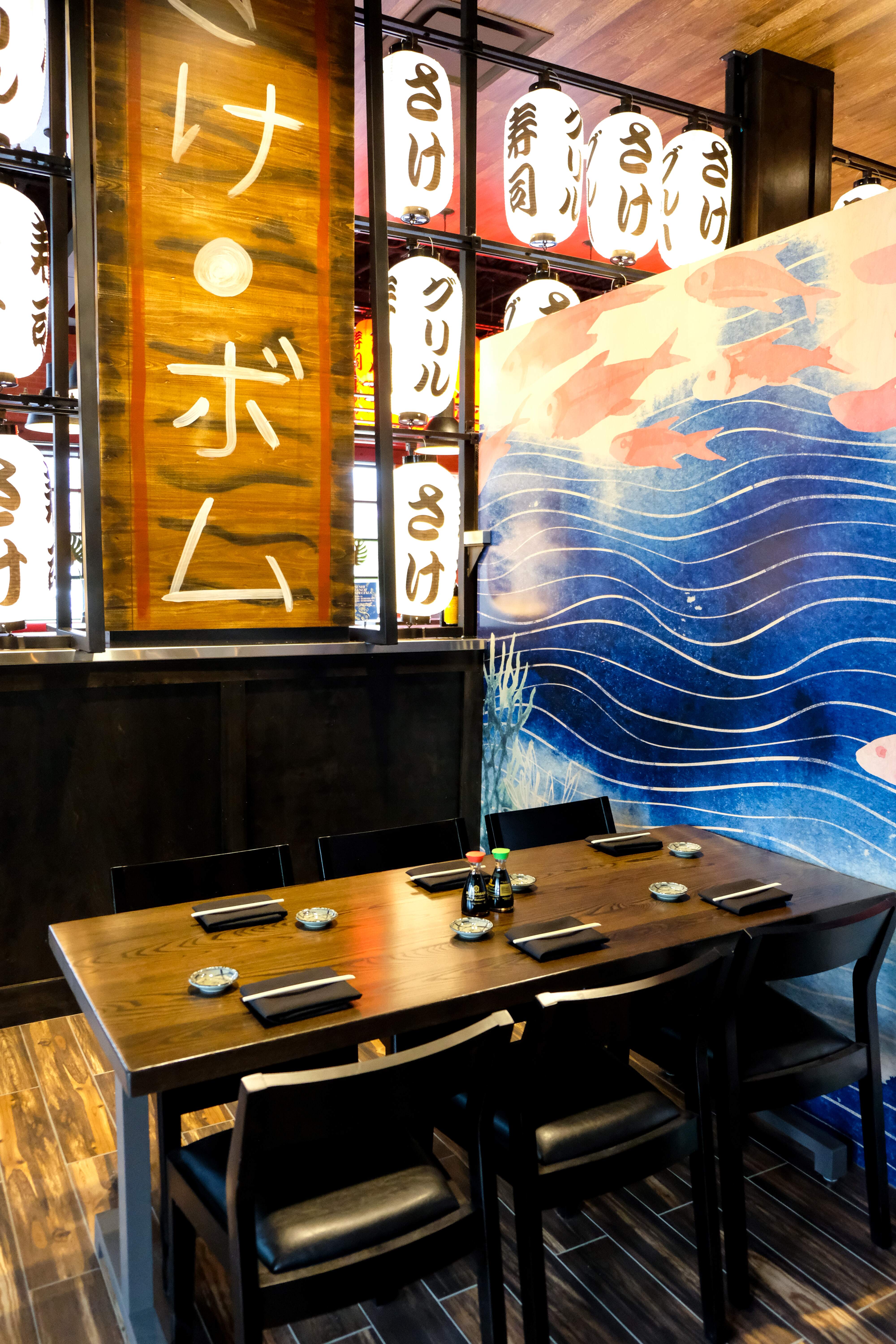 A table set up inside of Blue Sushi Sake Grill. 